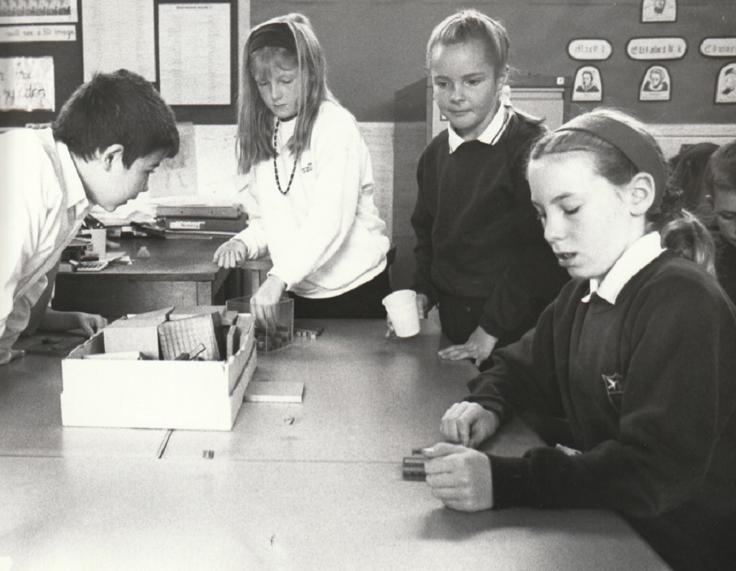 YOUNGSTERS: From left: David, Kate, Sally and Lyndsay, all aged nine, playing a dice game as part of a mathematics workshop in 1994