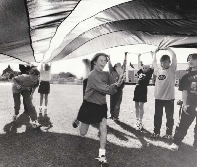 PARACHUTE: Black Combe School pupils get to grips with their new parachute canopy in 1997