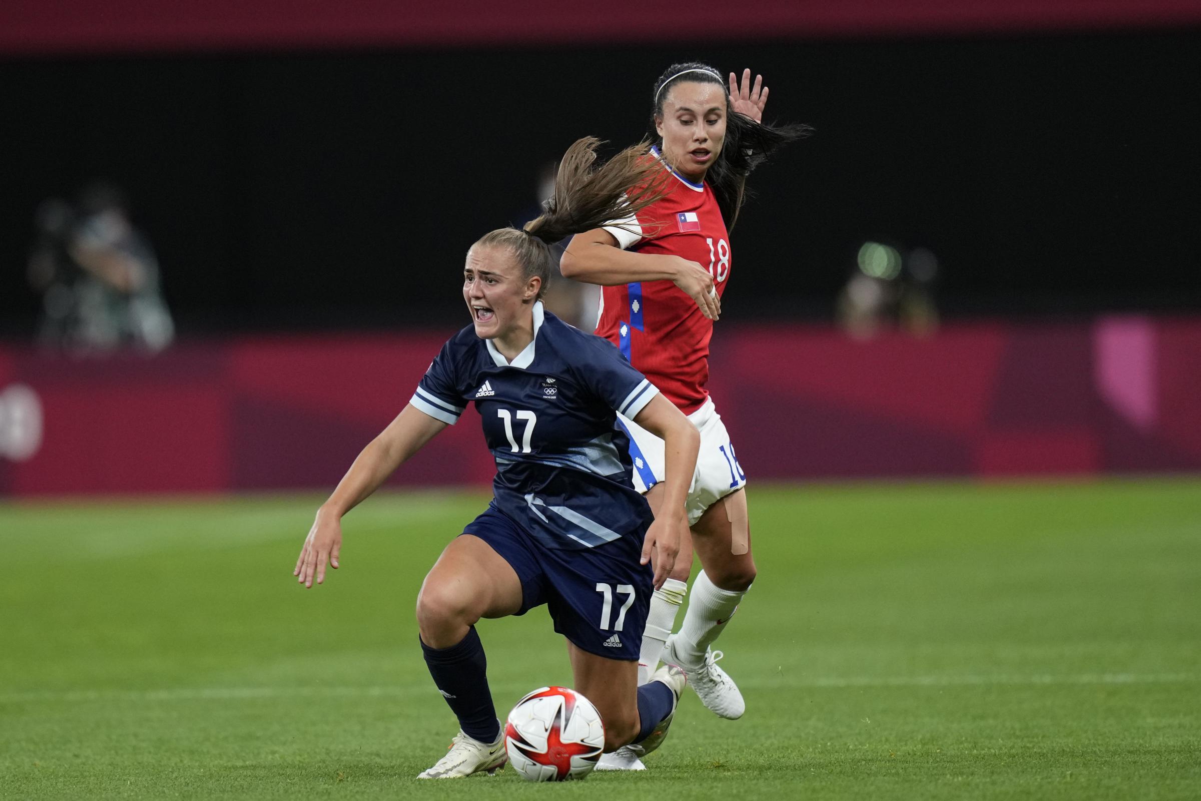 BATTLE: Georgia Stanway and Chile’s Camila Saez compete for the ball Picture: AP Photo/Silvia Izquierdo