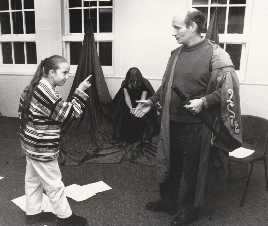 ACT: Carly Mallinson, 11, portrays Macbeth with expressive arts teacher Rick Lee during Parkview School’s Back to School evening in 1994