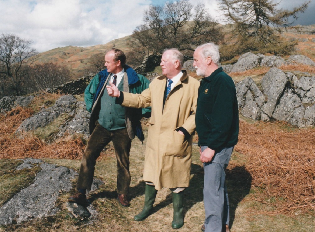 Sir Desmond Pilcher, chairman of North West Water, looking at work completed on the route up Wansfell in 1996, with Oliver Maurice, the National Trust’s North West regional director, and Peter Taylor, the trust’s head warden for Windermere