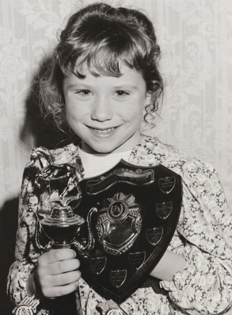 AWARD: Lauren Wood, of Barrow, with her prizes for most points in leading rein and gymkhana at the Furness Pony Club awards event in 1990