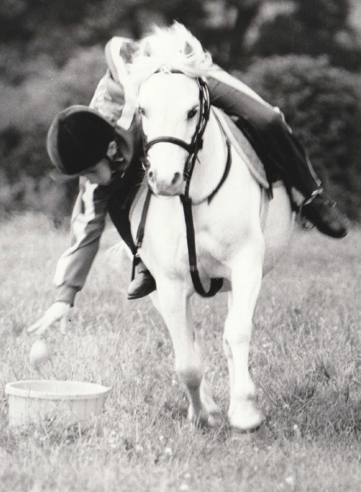PONY: Chris Hadwin, 13, on Harold, drops a ball into a bucket as he races down a course. Chris was a member of the Furness Pony Club senior team which qualified for the area finals of the Pony Club Mounted Championships in 1997