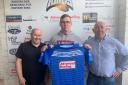 New Barrow Raiders signing Connor Terrill with rugby director Andy Gaffney and chairman Steve Neale