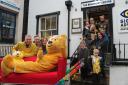CHEERS: Children waving the BBC North West team and Pudsey off on their challenge