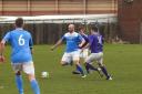 CUP UPSET: Croftlands (in purple) scored five goals without reply at the Training Pitch to reach the semi-finals