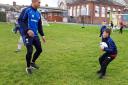 STUCK IN: Year 5 pupils practicing their skills with Barrow Raiders