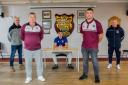 Workington Town director Graeme Peers, Millom vice-chair Paul Roskell, new Town signing Ethan Bickerdike, Millom head coach Tom Sibley and Town head of development Gary Hewer. Picture: Gary McKeating