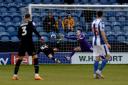 Ben Whitfield scores to put Barrow into the lead 0-1 during the Sky Bet League 2 match between Colchester United and Barrow at the Weston Homes Community Stadium, Colchester  Pictures: Richard Blaxall | MI News