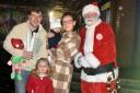 The McKenna family with Santa at the switch-on event