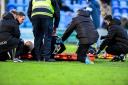 Robbie Gotts (15 Barrow) gets onto stretcher during the Sky Bet League 2 match between Colchester United and Barrow at the Weston Homes Community Stadium, Colchester on Saturday 25th November 2023. (Photo: Kevin Hodgson | MI News).