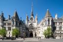 A view of The Royal Courts of Justice in London (Aaron Chown/PA)