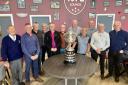 Some of the former players came together in November to mark the anniversary of a trophy win