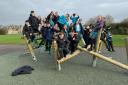 The Victoria Academy pupils on their well-earned new piece of playground equipment