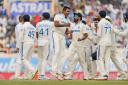 India’s Ravichandran Ashwin celebrates the wicket of England’s Joe Root (Ajit Solanki/AP)