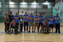 Teaming up: Hindpool Tigers players, in their special shorts, sponsored by Des Johnston Recruitment,  and and members of the Wildcats Wheelchair Sports Club. The Hindpool masters will take on the RL All Stars tomorrow in a charity match to raise money