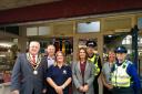 SPECIAL THANKS: Members of Ulverston Community Enterprises with the town's mayor Dave Webster and members of the Ulverston Neighbourhood Policing Team at he opening of Ulverston's new police station.