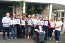 FUDLOVE: Fud's Army hand over £18,673.47 from Fudstock to St Mary's Hospice 