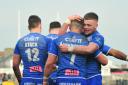 SCORE: Barrow Raiders celebrate a try against Dewsbury Rams Picture: Donna Clifford