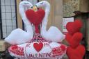 The Valentine's themed post box topper outside Millom post office
