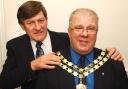 Ulverston mayor Councillor John Birkett (left) passes on the mayoral chain of office to Councillor Dave Miller for his fourth term as the Ulverston mayor in 2005