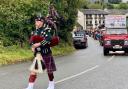 Scottish bagpiper leads the Furness & District Tractor Run