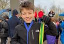 Tom with his medals at the National Primary and Year Seven Cross Country Finals