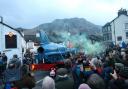 Crowds welcome the Bluebird K7 to its 'spiritual home' in Coniston