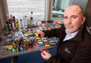 Graham Matthews, Manchester Airport's head of terminal security, with some of the items confiscated in just one morning