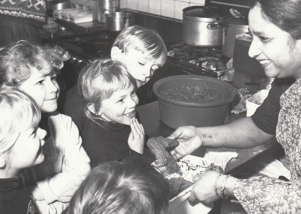 EAT: Abida Ahmed demonstrates how to make tandoori chicken to children from North Walney Primary School during their visit to the Monihar restaurant in 1995