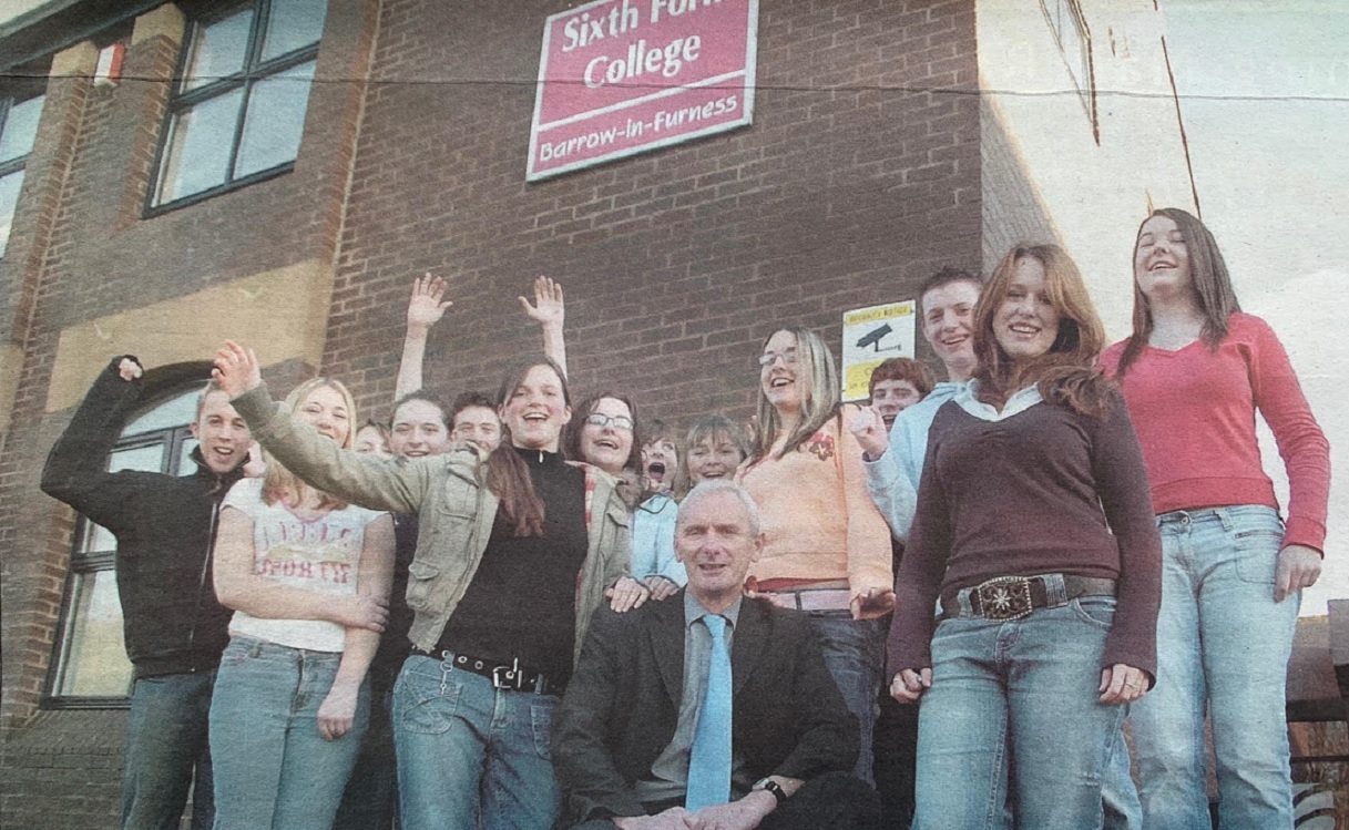 COLLEGE: Barrow Sixth From College principal David Kelly celebrating with students after the college was named in Ofsted’s annual list of outstanding schools in 2005