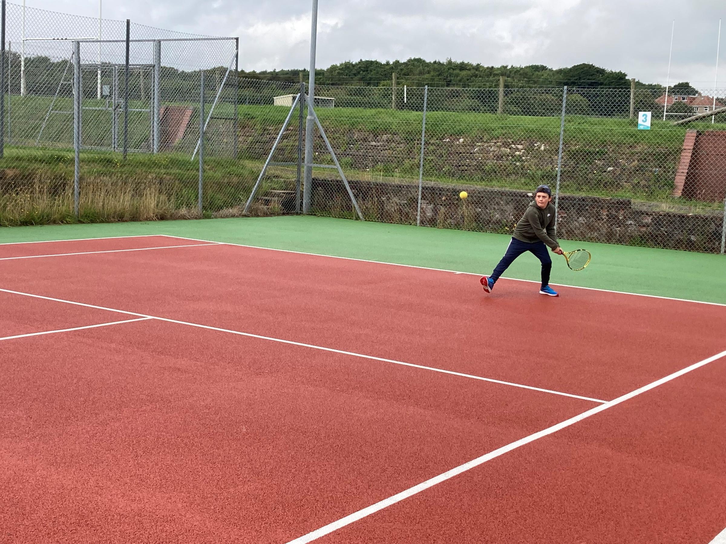 SWING: Charlie Crellin poised on Hawcoat Park’s newly opened tennis courts