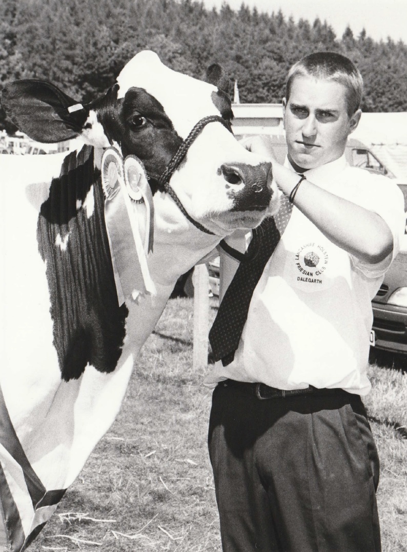 TWIZZLE: John Battersby, of Scales Farm, Scales, with supreme champion of show, the heifer Twizzlefoot Conquest Vall at Cartmel Show in 1995