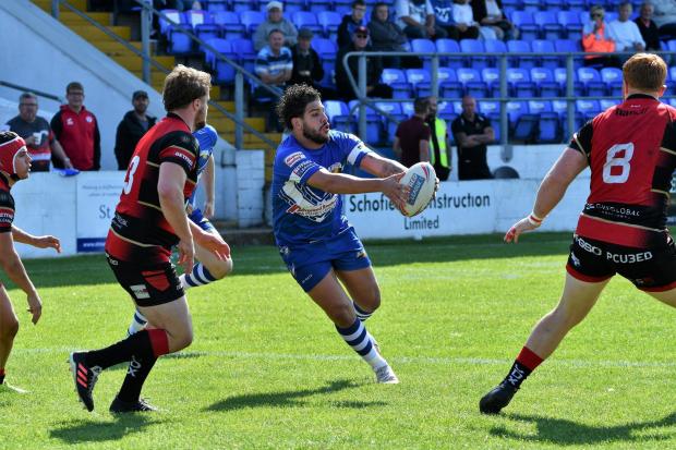DAZZLING: Hakim Milouide on his way for a great try