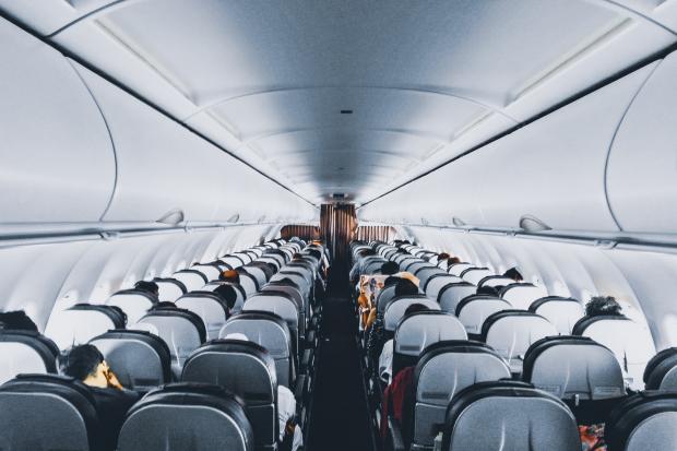 The Mail: Rows and rows of plane seats. Credit: Canva