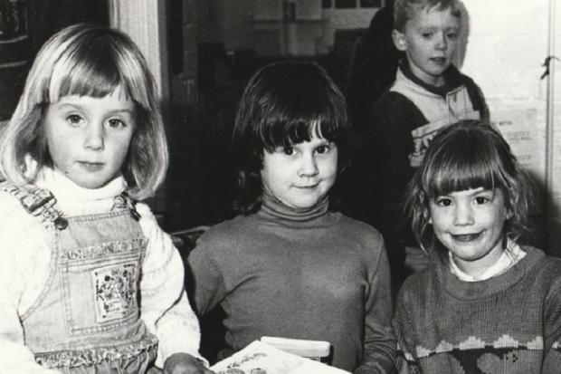 LIBRARY: An undated photograph from The Mail’s archives showing pupils at the opening of a new library at Thwaites School
