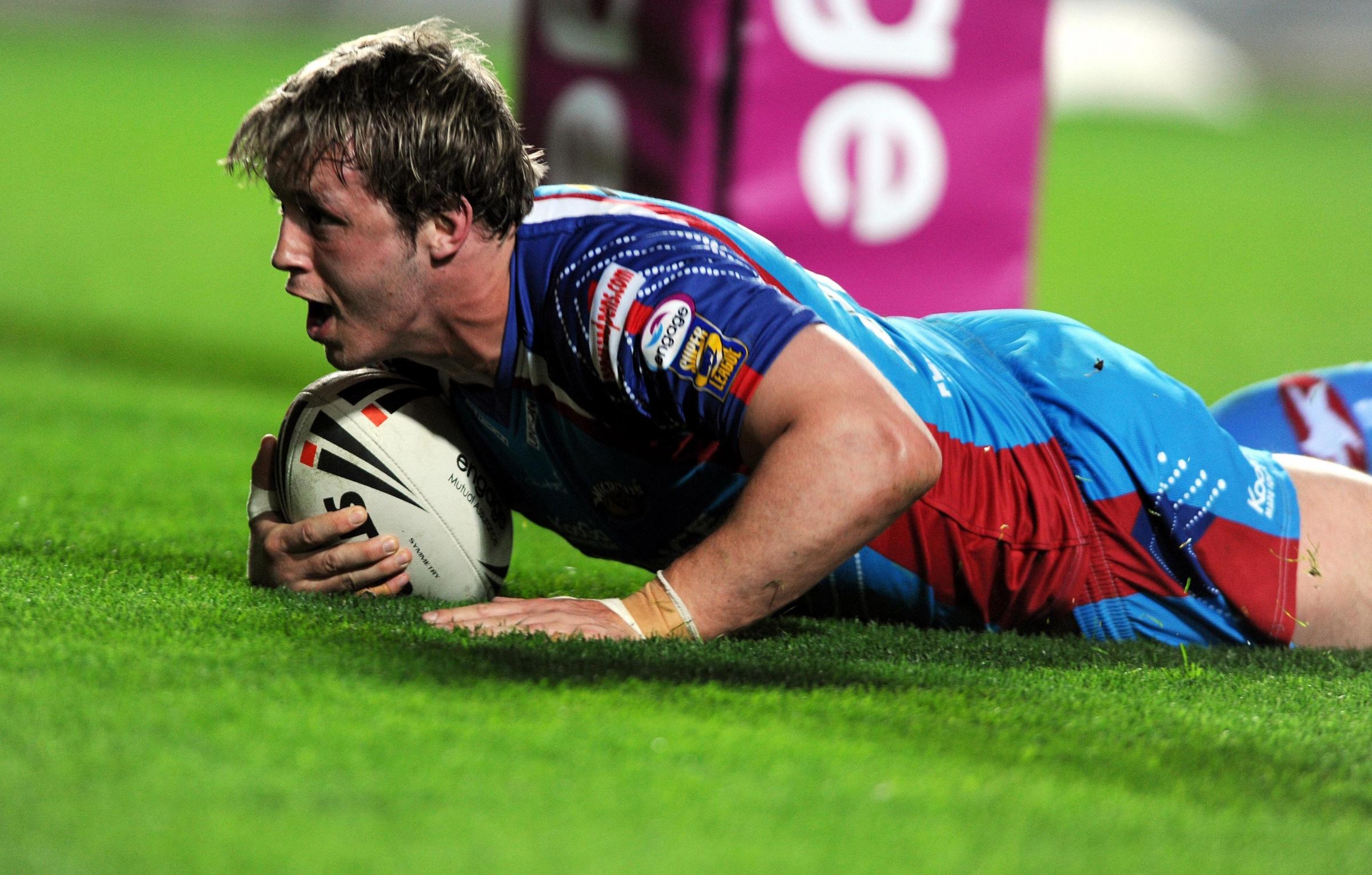 SCORE: Oliver Wilkes scores a try for Wakefield during the engage Super League match at the KC Stadium, Hull. Picture date: Friday April 17, 2009. Photo: Julia Hoyle/PA Wire