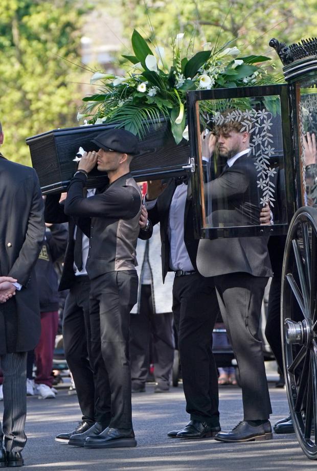 The Mail: Max George and Jay McGuiness of The Wanted carry the coffin at the funeral of their bandmate. (PA)