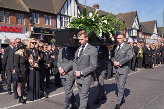 The Mail: The coffin of The Wanted star Tom Parker is carried ahead of his funeral. (PA)