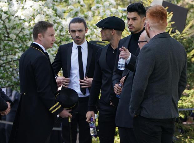 The Mail: The members of The Wanted (left to right) Max George, Jay McGuiness, Siva Kaneswaran and Nathan Sykes (partially hidden) arrive for the funeral of The Wanted star Tom Parker. (PA)