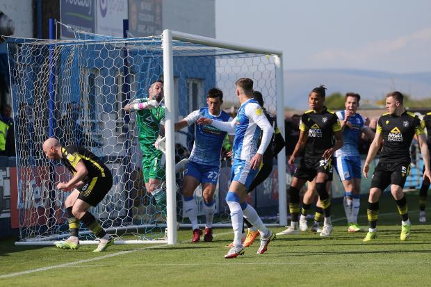 Barrow’s players scramble to get the ball over the line only for referee Ben Toner to rule that it didn’t cross. Pictures: Mark Fletcher | MI News