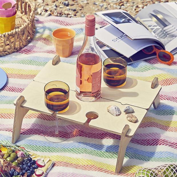 The Mail: personalized portable picnic table bottle holder.  Credit: Not on Main Street