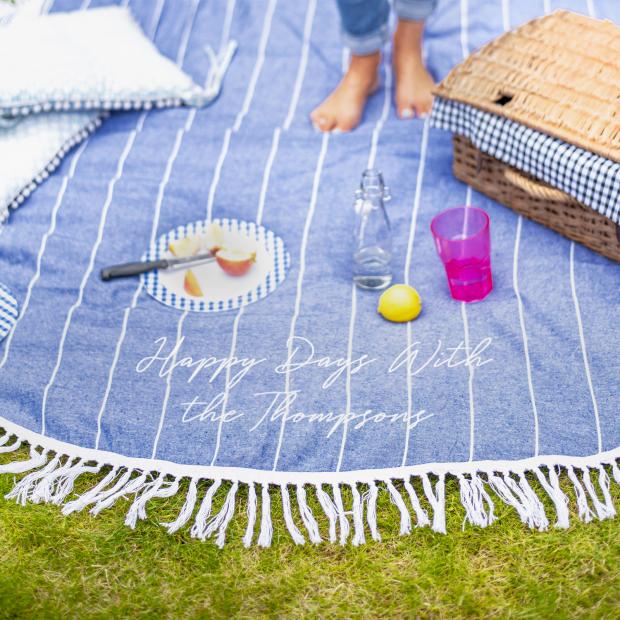 The Mail: Personalized Round Blue Picnic or Beach Blanket.  Credit: Not on Main Street