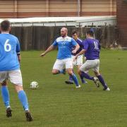 CUP UPSET: Croftlands (in purple) scored five goals without reply at the Training Pitch to reach the semi-finals