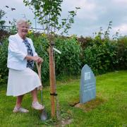 PROUD: Barrow W.I. President, Elaine Wright, standing over the new tree