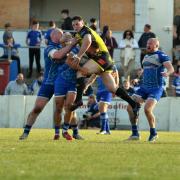 Anton Iaria makes a tackle