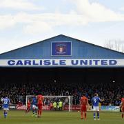 Carlisle United's home Brunton Park Stadium. Both clubs and the police are asking spectators to behave 'responsibly.'