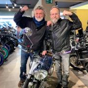 Dave Myers, right, with co-star Si King, left, after purchasing his new bike