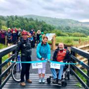 Lake District National Park Authority Chief Executive, Richard Leafe with the Rt Hon Trudy Harrison MP and local resident Alan Towart at the official opening of the West Windermere Way route.