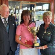 Bill Joughin & Lady Captain presenting Trophy to Sue Kirkby